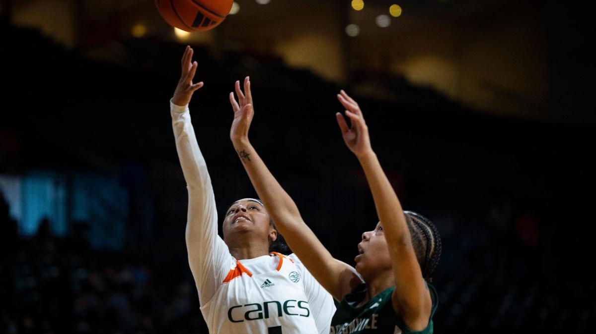 Miami Hurricanes Lemyah Hylton (1) shoots a basket during the fourth quarter of the University of Miami home opener on Thursday, Nov. 9, 2023, at the Watsco Center in Coral Gables.