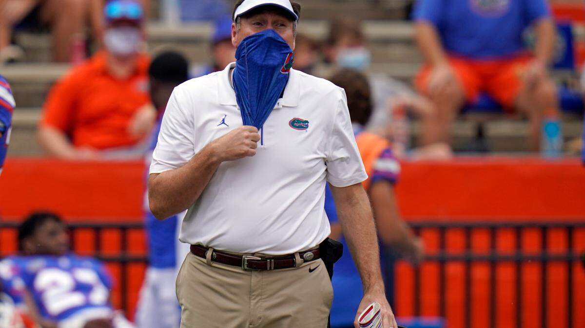 Florida head coach Dan Mullen directs his team against Kentucky during the first half of an NCAA college football game, Saturday, Nov. 28, 2020, in Gainesville, Fla.
