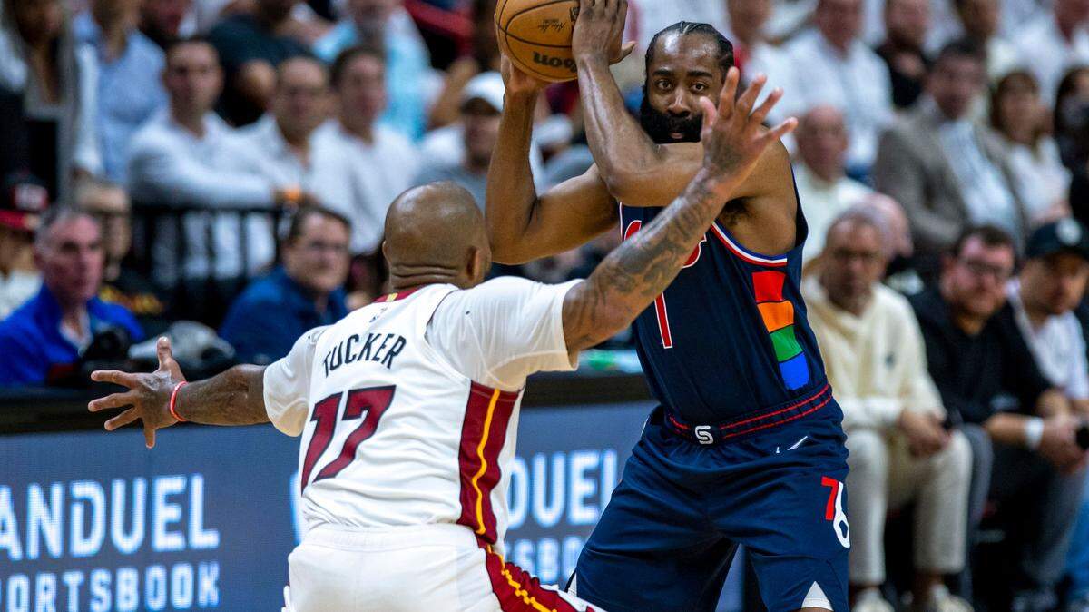 Miami Heat forward P.J. Tucker (17) defends Philadelphia 76ers guard James Harden (1) during the second half of Game 1 of a second round NBA Eastern Conference semifinal playoff series at FTX Arena in Miami, Florida, on Monday, May 2, 2022.