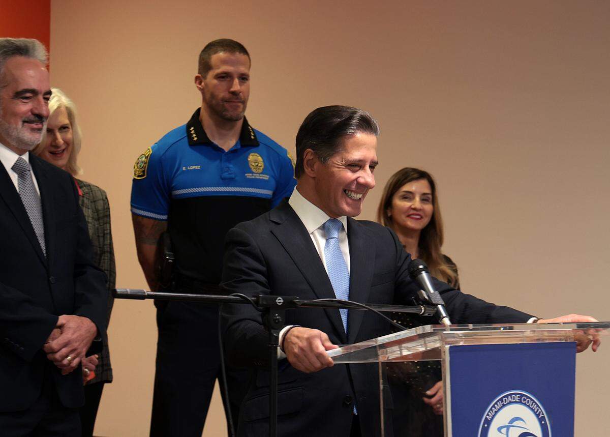 Miami-Dade Schools Superintendent Alberto Carvalho smiles after being asked which basketball team he will now support, the Heat or the Lakers. On Thursday, Dec. 9, 2021, Carvalho announced his departure for Los Angeles as its new superintendent during a press conference at iPrep Academy in Miami.