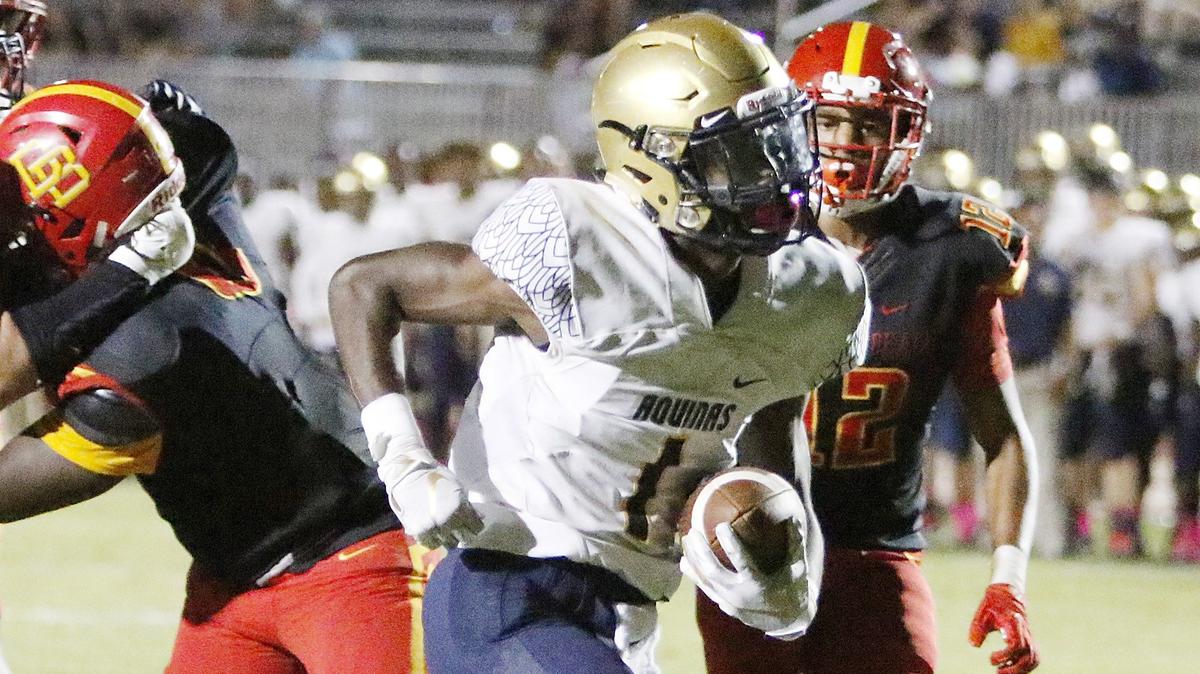 St. Thomas Aquinas Raiders’ running back Nigel White (1) scores a touchdown against the Deerfield Beach Bucks during the football game on Friday, October 5, 2018 at Deerfield Beach.