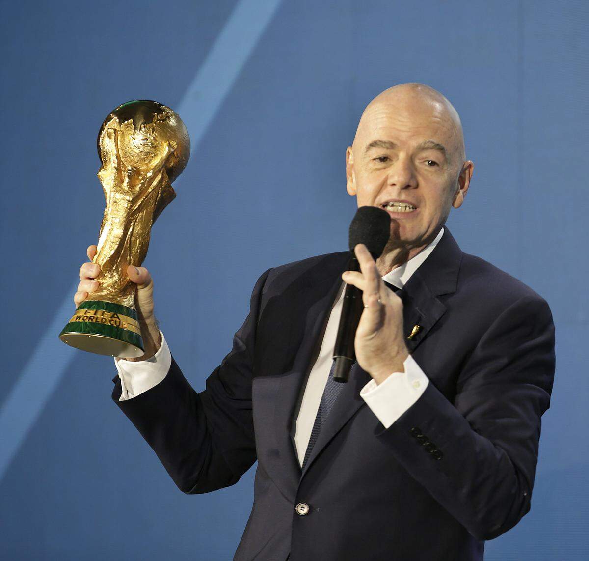 FIFA President Gianni Infantino hold a World Cup trophy swhile speaking during a discussion to celebrate the relationship between FIFA and Miami Dade College and the roll of soccer in Miami and across United States on Wednesday, February 25, 2026 at Miami Freedom Tower at Miami Dade College in Miami. Andrew Uloza / for Miami Herald