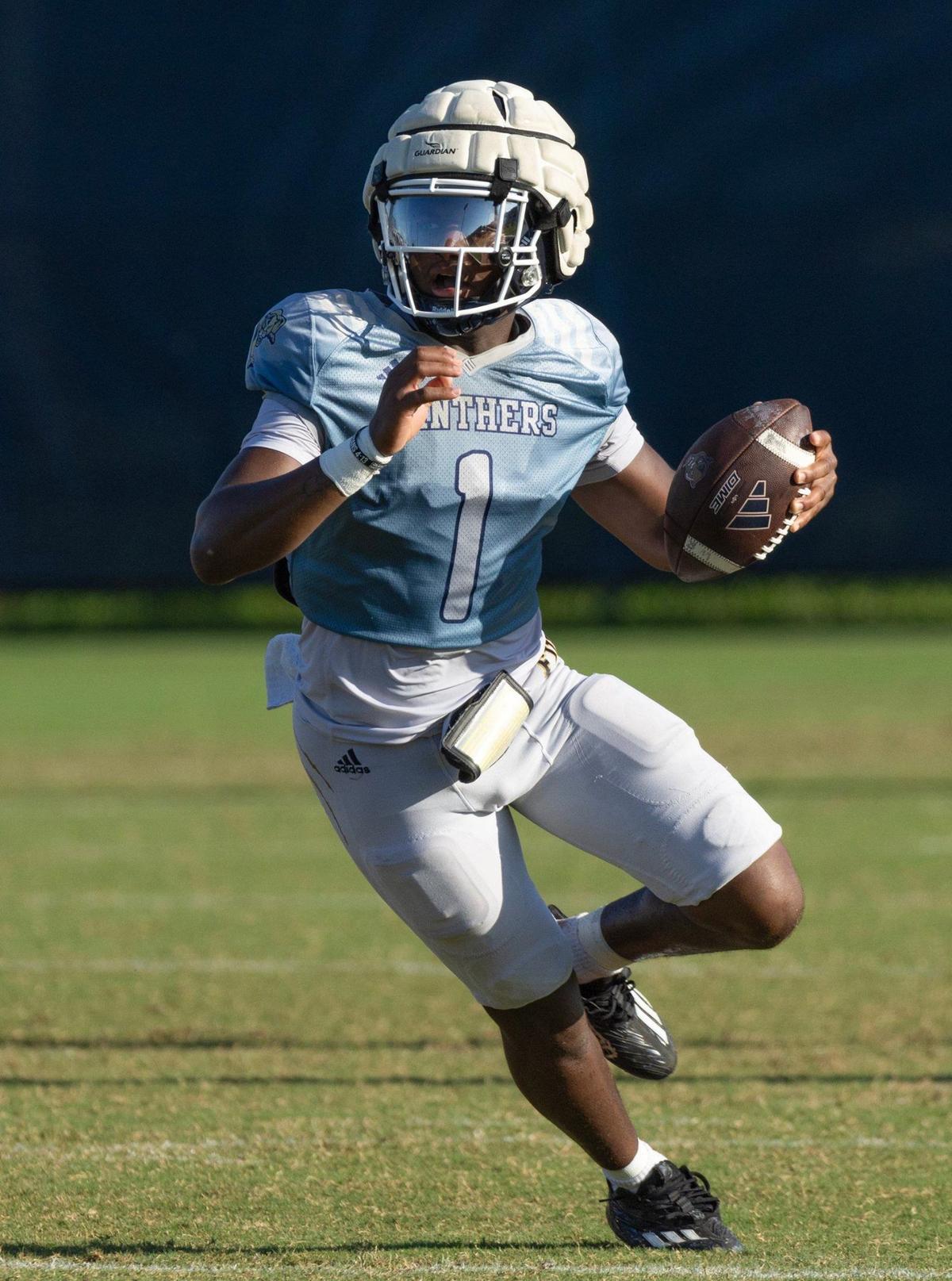 Florida International University quarterback Keyone Jenkins scrambles in the backfield during practice drills on campus in Miami, Florida on Thursday, August 15, 2024.