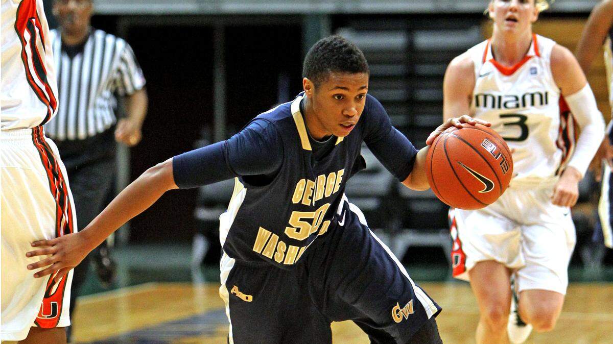 George Washington University women’s basketball player Kye Allums takes the ball down court as they play the University of Miami at the BankUnited Center at UM on Dec. 28, 2010. Allums was one of the first openly transgender student-athletes to compete in Division 1 women’s basketball.