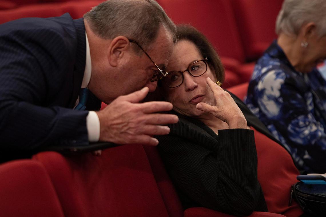 Neisen Kasdin, a former Miami Beach mayor and a lawyer representing the Aventura Mall, speaks with Aventura Mayor Enid Weisman Friday at a county commission meeting on a $76 million proposal to build a new train station for Brightline by the retail destination. Both spoke in favor of the proposal, which passed.