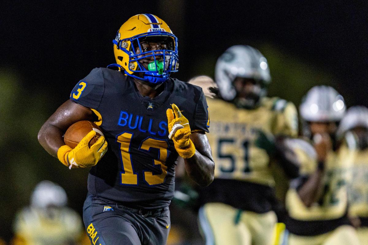 Miami Northwestern defensive lineman Jarvis Hill (13) scores a pick six during a high school football game against Miami Central at Traz Powell in Miami, Florida, on Friday, October 6, 2023.