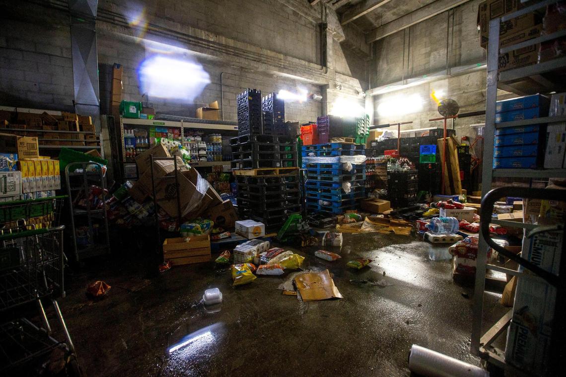 Wet food items sit strewn about inside a storage area for a Publix off Southwest First Avenue in the Brickell neighborhood of Miami, Florida, on Saturday, June 4, 2022. Flood waters got hip-high in the area the night before.