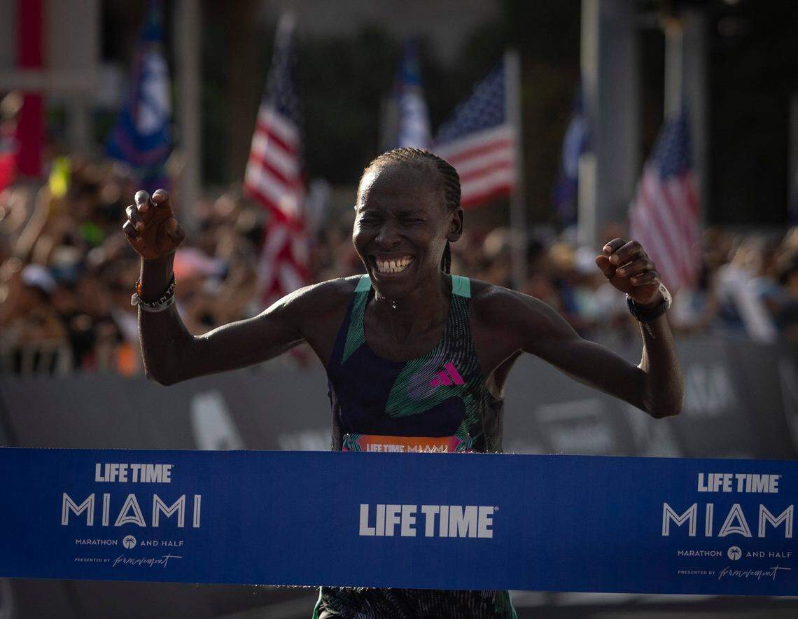 Leah Rotich, 34, finishes as the first woman to cross the finish line of the full marathon during the Life Time Miami Marathon and Half on Sunday, Jan. 28, 2024, finishing at Bayfront Park in downtown Miami.
