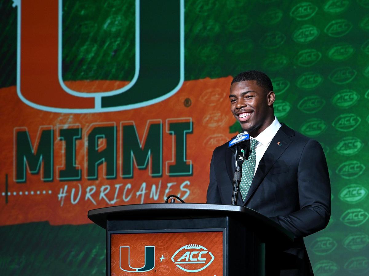 Miami Hurricanes safety Kamren Kinchens laughs as he answers a question during the first day of the 2023 ACC Football Kickoff event in Charlotte, NC on Tuesday, July 25, 2023.