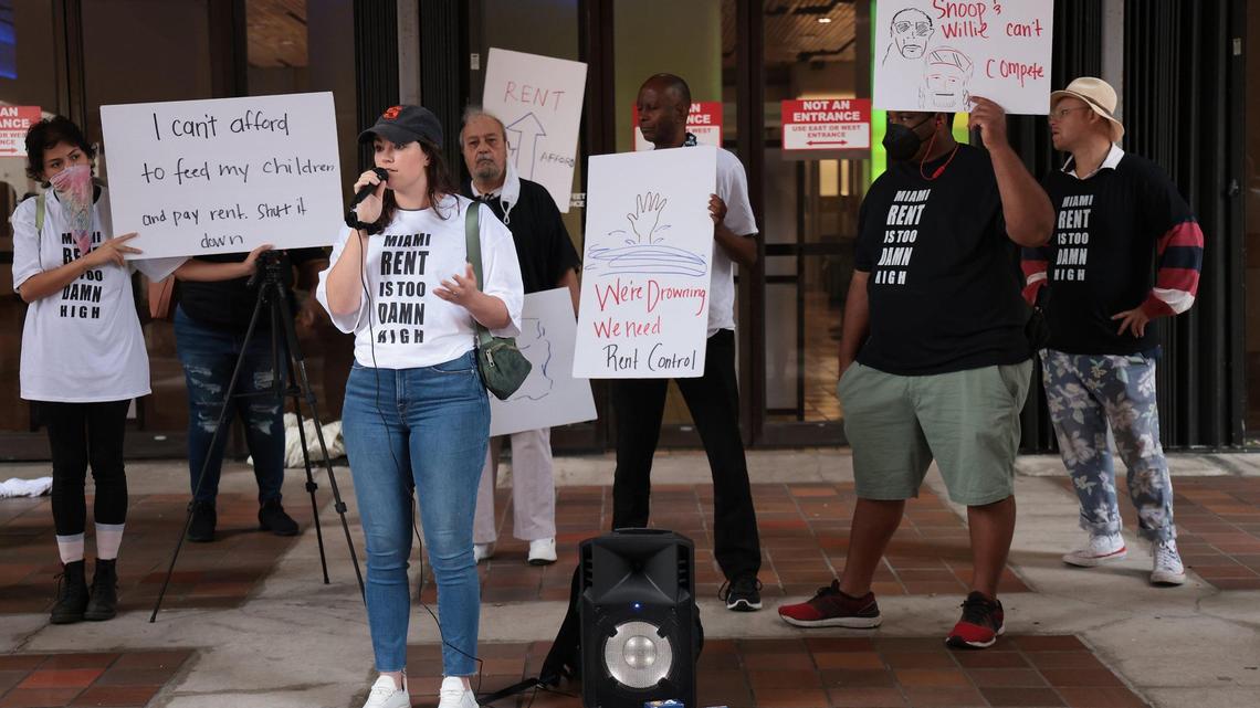 Emily Moloney, software account manager, 31, shares her story on a sudden rent increase she faced at her downtown Miami apartment. She was a speaker at a downtown rally for help with soaring housing prices. The fair housing advocates from Miami Coalition to Advance Racial Equity, Struggle for Miami’s Affordable and Sustainable Housing (SMASH), Wyn Women, and others rallied in protest of high rents and for affordable housing ahead of the county commission meeting at County Hall in Miami on Tuesday, March 15, 2022.