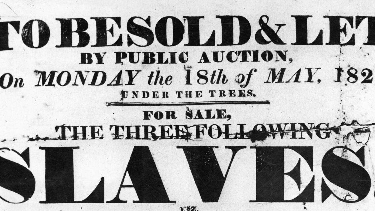 An 1829 poster advertising a public auction of slaves.