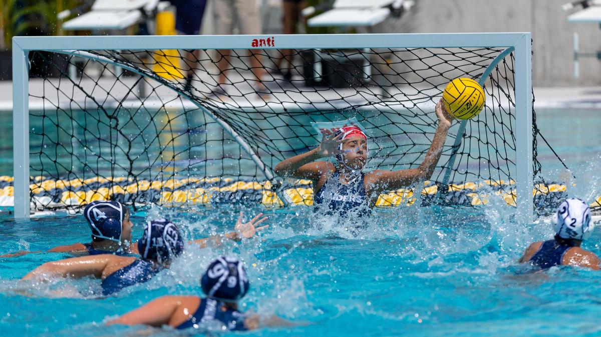 Gulliver Prep goalie Sofia Beltran (1) blocks a shot during the 2023 girls’ state water polo championship at Belen’s Gian Zumpano Aquatic Center in Miami, Florida, on Saturday, April 15, 2023.