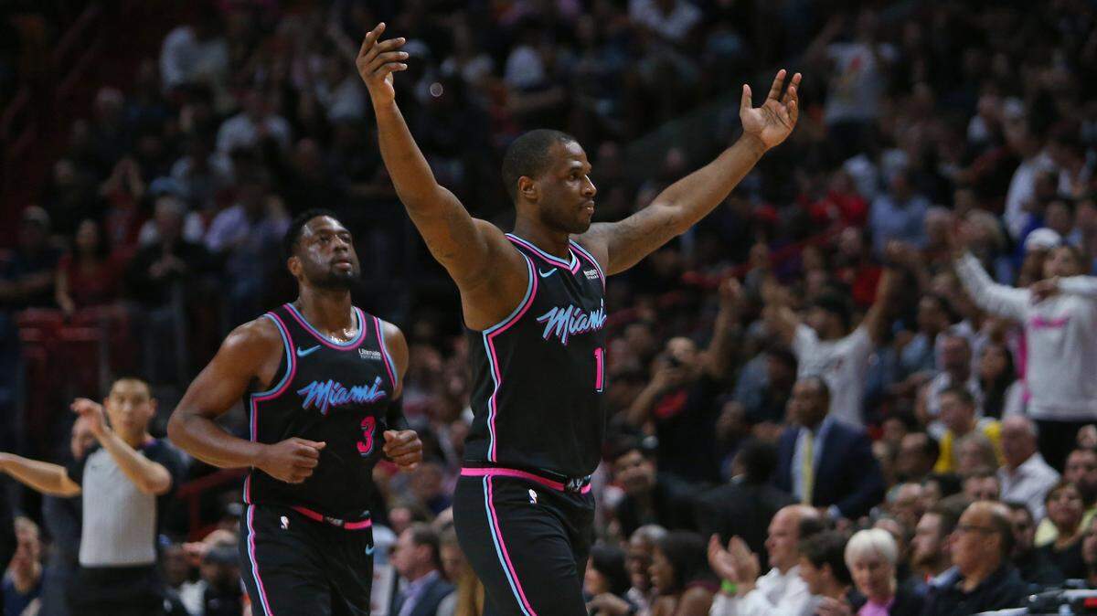 El escolta del Heat Dion Waiters (11) celebra una canasta junto a Dwyane Wade (3) el 8 de enero ante los Nuggets en el AmericanAirlines Arena.