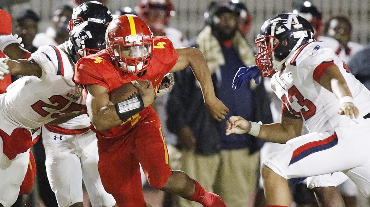 Deerfield Beach Bucks running back Jaylan Knighton (4) runs the ball against the Miramar Patriots during the football playoff game on Friday, November 9, 2018 at Deerfield Beach High in Deerfield Beach.