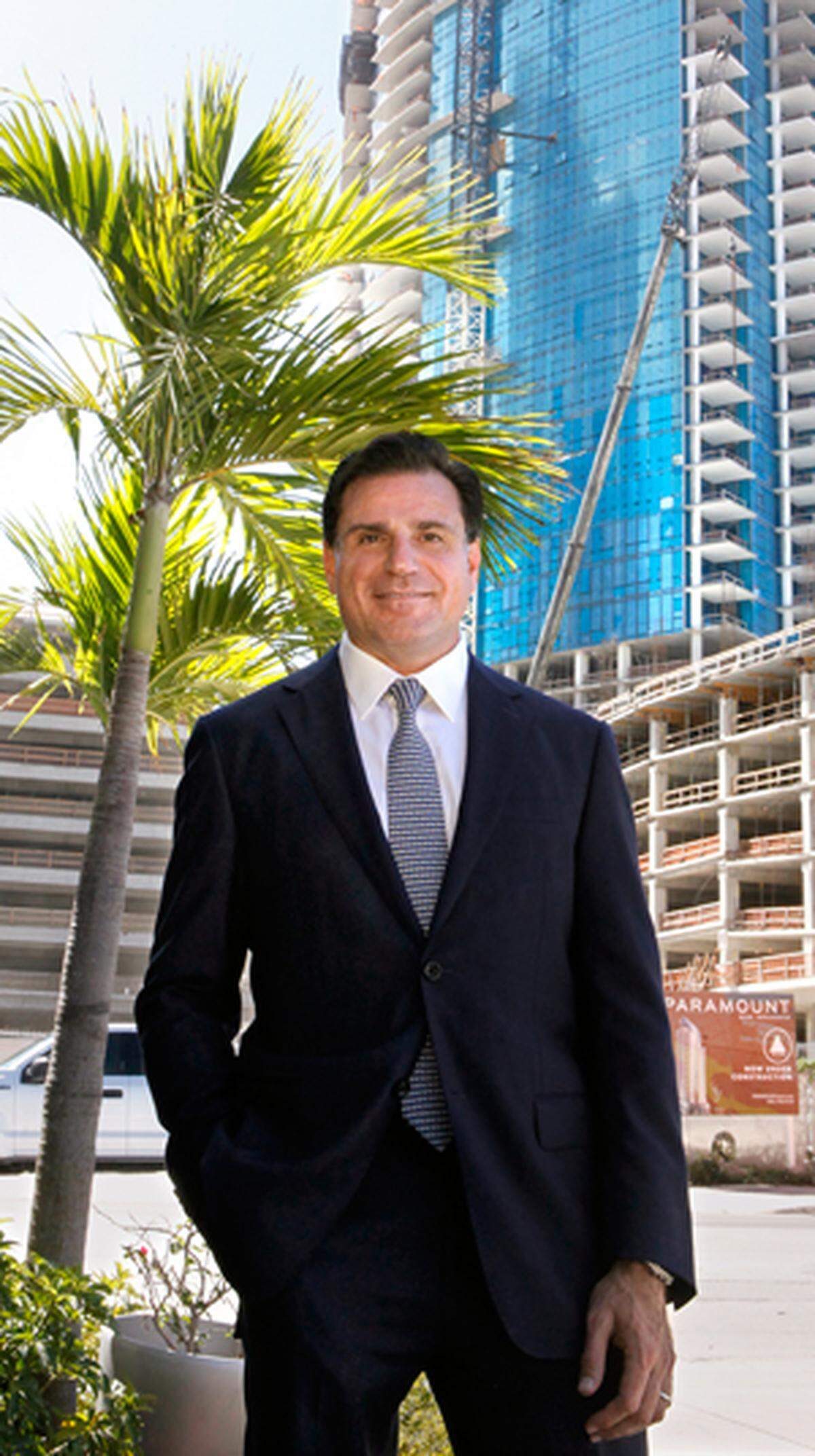 “This is where reputation and execution matters,” said Dan Kodsi, CEO of the Paramount Miami developer Royal Palm Companies. Above: Kodsi stood in front of Paramount Miami Worldcenter when the 60-story condo tower was under construction. It was completed in 2018.