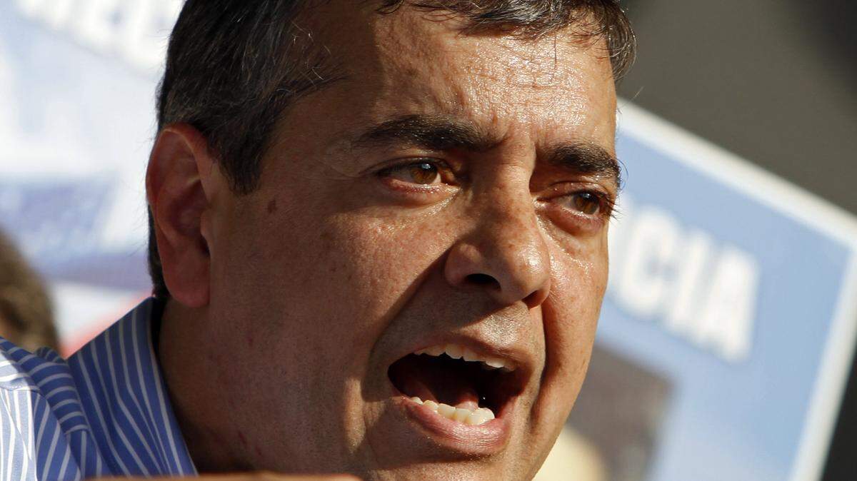 Former Congressman David Rivera, a Miami Cuban-American Republican embroiled in a scandal over a $50 million contract with the sanctioned Venezuela state-owned oil company PDVSA, is pictured in a 2011 photo speaking about his bid to run for his old U.S. House seat amid an investigation into campaign finance violations.