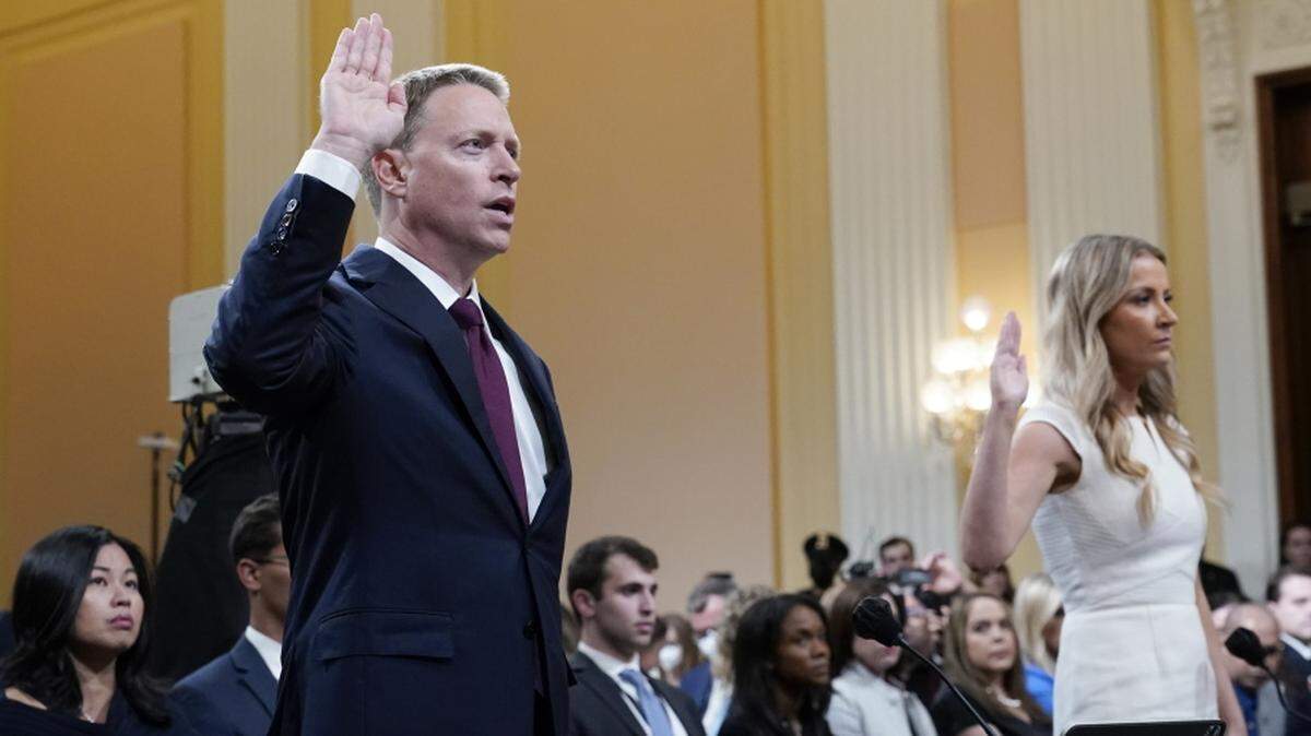 Trump White House staffers Matt Pottinger, left, and Sarah Matthews are sworn in before testifying to the House select committee investigating the Jan. 6 attack on the U.S. Capitol.