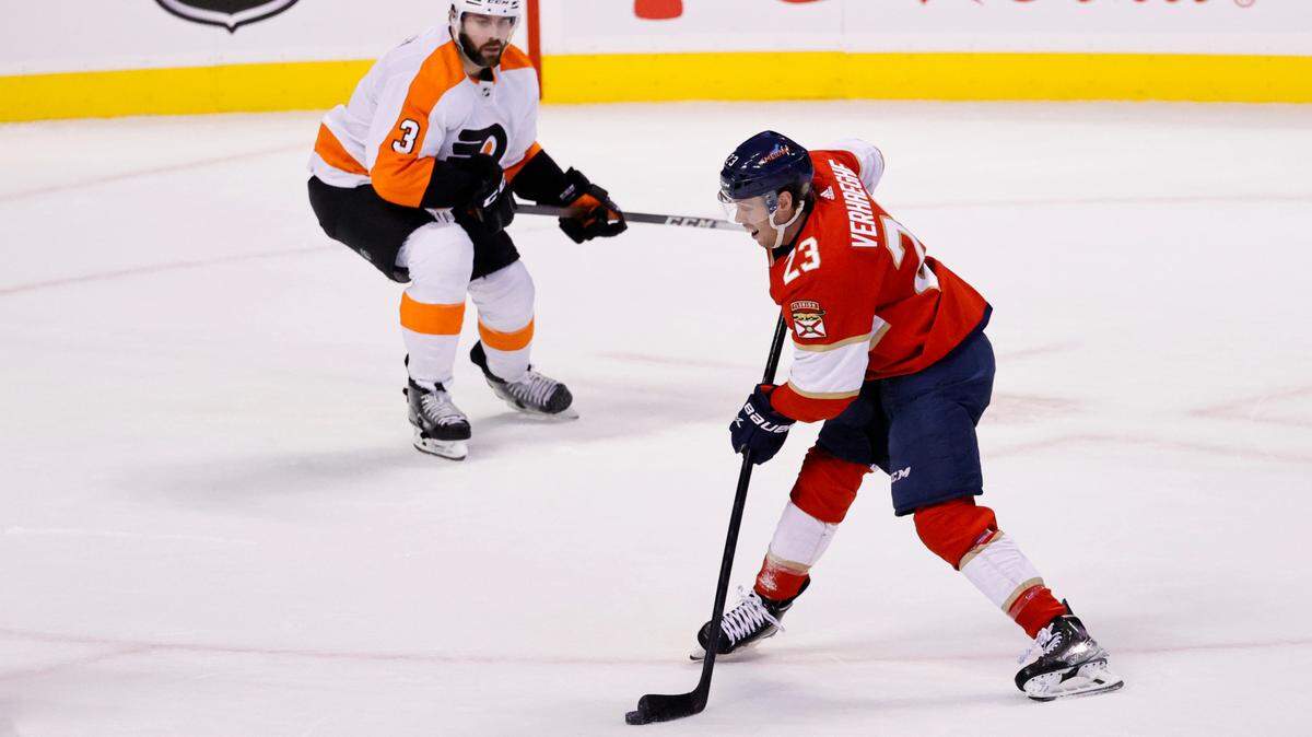 Florida Panthers center Carter Verhaeghe (23) shoots for a goal against the defense of Philadelphia Flyers defenseman Keith Yandle (3) during the first period of an NHL game at the FLA Live Arena on Thursday, March 10, 2022 in Sunrise, Fl.