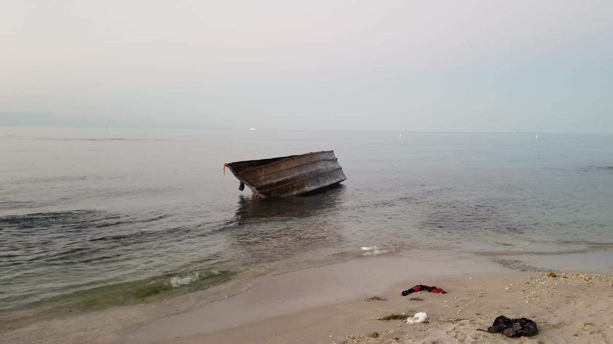 A rustic boat sits on shore of Key West Monday, April 1, 2019. It carried a group of six Cuban nationals who told U.S. Border Patrol agents they left Mariel, Cuba, on March 30.