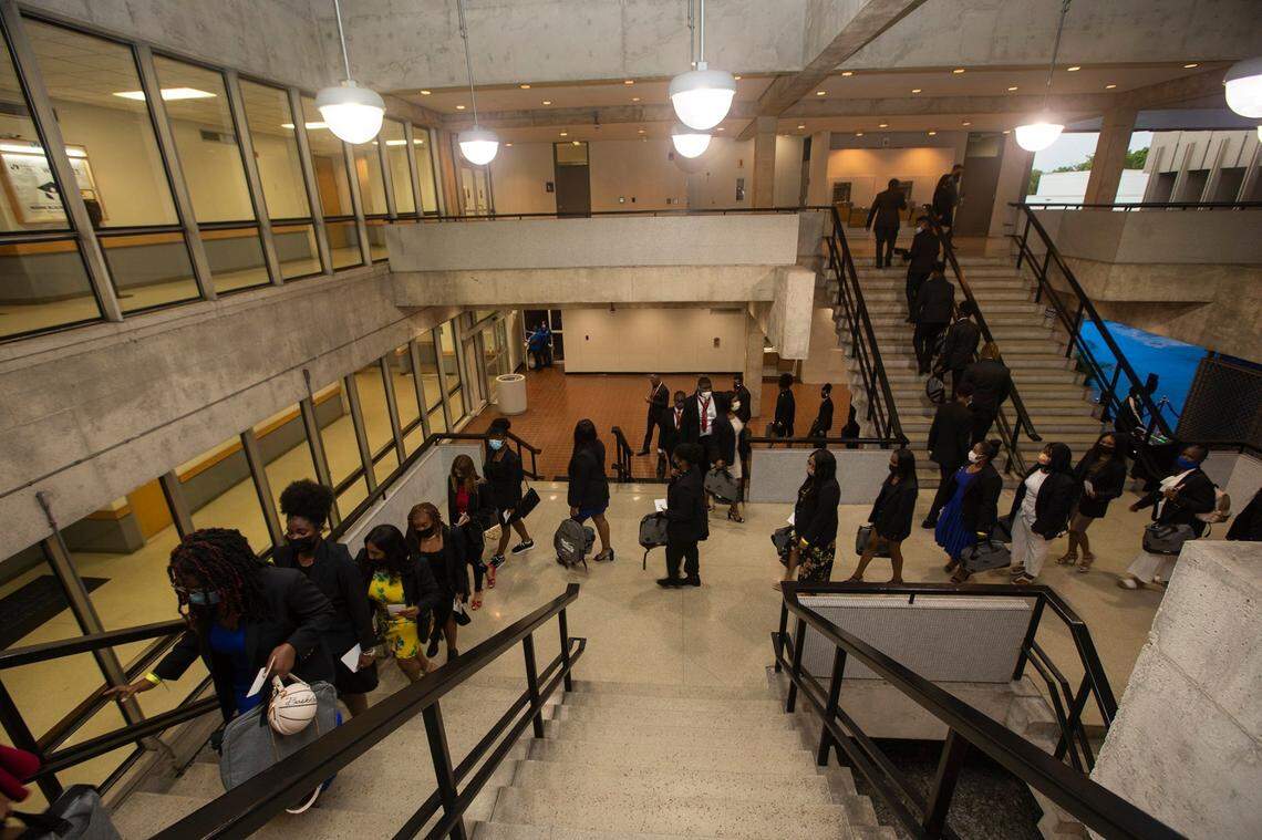 Students arrive at The 5000 Role Models Excellence Project inaugural class at MDC North Campus Conference Center on Tuesday June 6, 2021.