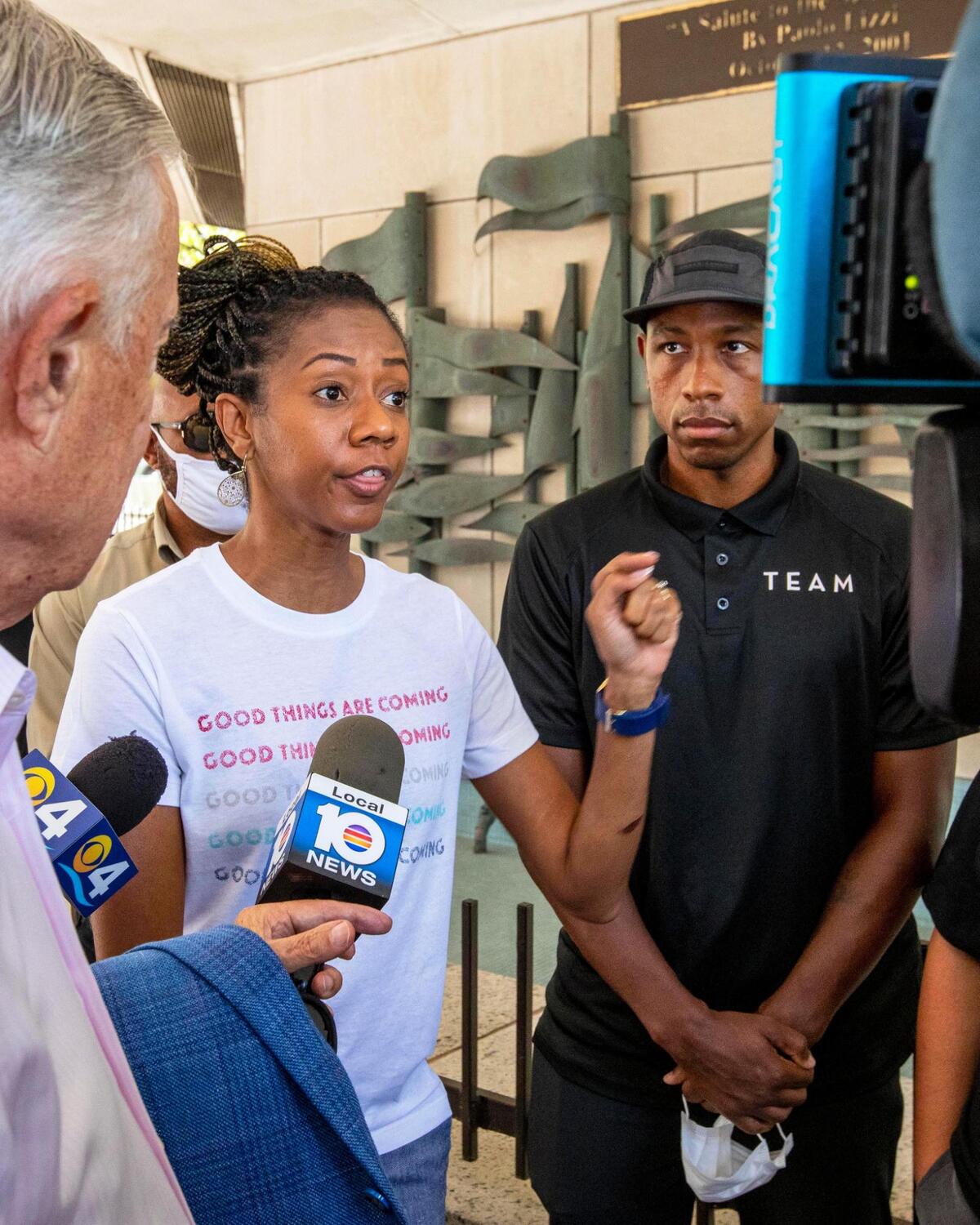 Vice President for Touching Miami with Love, Trina Harris, speaks to the media along with other grassroots organizations like the Circle of Brotherhood, Dream Defenders, Roots Collective and Florida Rising. The newly formed coalition wants $30 million of the $500 million Miami-Dade gets as part of President Biden’s American Rescue Plan to be devoted to their programs.