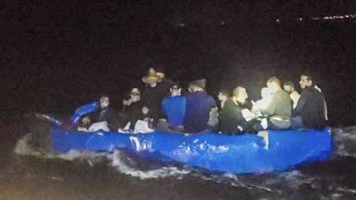 A group of 16 men from Cuba arrive on the shore of Boca Chica, a small island east of Key West, Wednesday, Sept. 29, 2021.