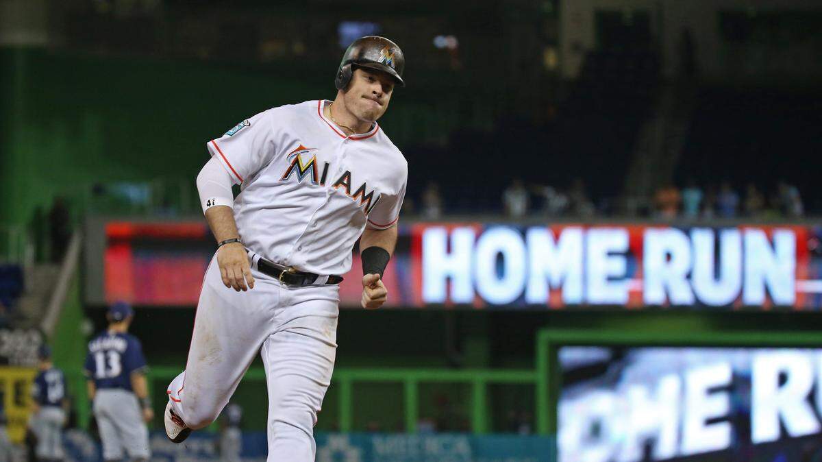 Miami Marlins first baseman Justin Bour rounds the bases after hitting a solo home run during the fourth inning of a Major League Baseball game against the Milwaukee Brewers at Marlins Park on Wednesday, July 11, 2018.
