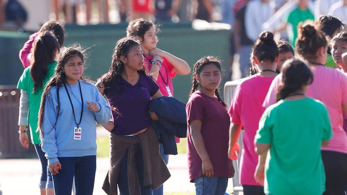 In February, girls rest after playing soccer at the Homestead Temporary Shelter for Unaccompanied Children.