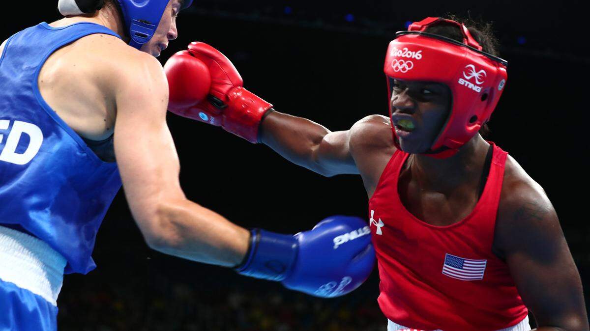 Claressa Shields, right, of the U.S. battles Nouchka Fontijn of the Netherlands in the women’s middleweight final on Sunday, Aug. 21, 2016 at Riocentro Pavilion 6 in Rio de Janeiro, Brazil. Shields won by a unanimous decison.