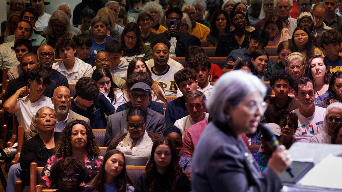 Attendees listen to Mayor Daniella Levine Cava shortly after she pledged $3 million to an eviction diversion program during the PACT Nehemiah Action Assembly at Sweet Home Missionary Baptist Church in Cutler Bay.