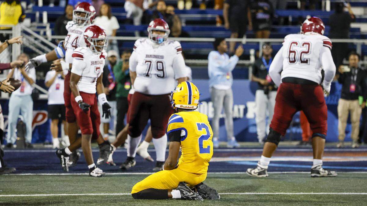 Miami Northwestern Nicholas Lennear (2) watches the vs. Raines Vikings celebrate the game winning touchdown during their Class 3A State Championship football game at FIU's Pitbull Stadium in Miami, Florida on Friday, December 12, 2025.