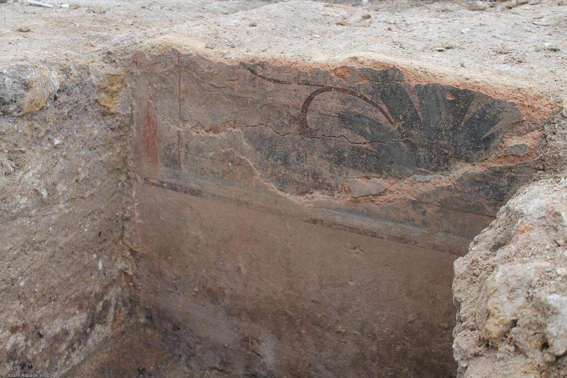 One of the painted plaster sections found at the site.