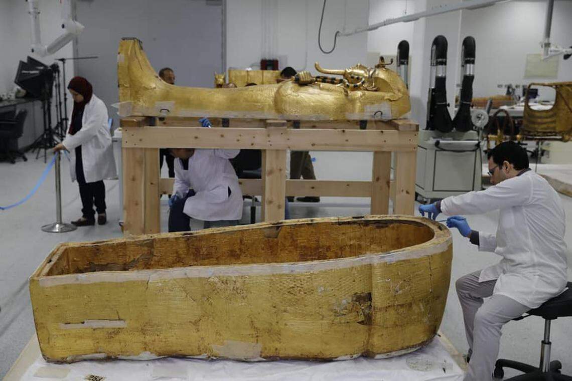 Inspecting King Tutankhamen’s coffin during its restoration in 2019.