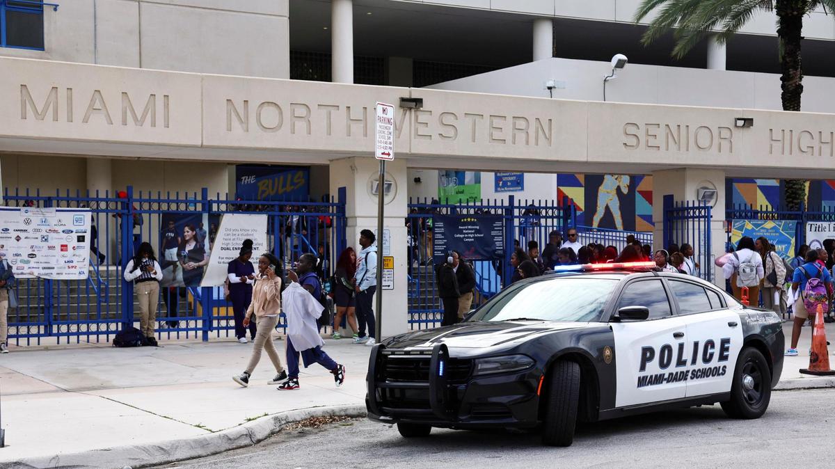 Students exit Miami Northwestern Senior High in Miami, Florida, Friday, January 12, 2024. Miami-Dade Public Schools increased its police presence at the school the day after a student was shot on campus following a boys basketball game.