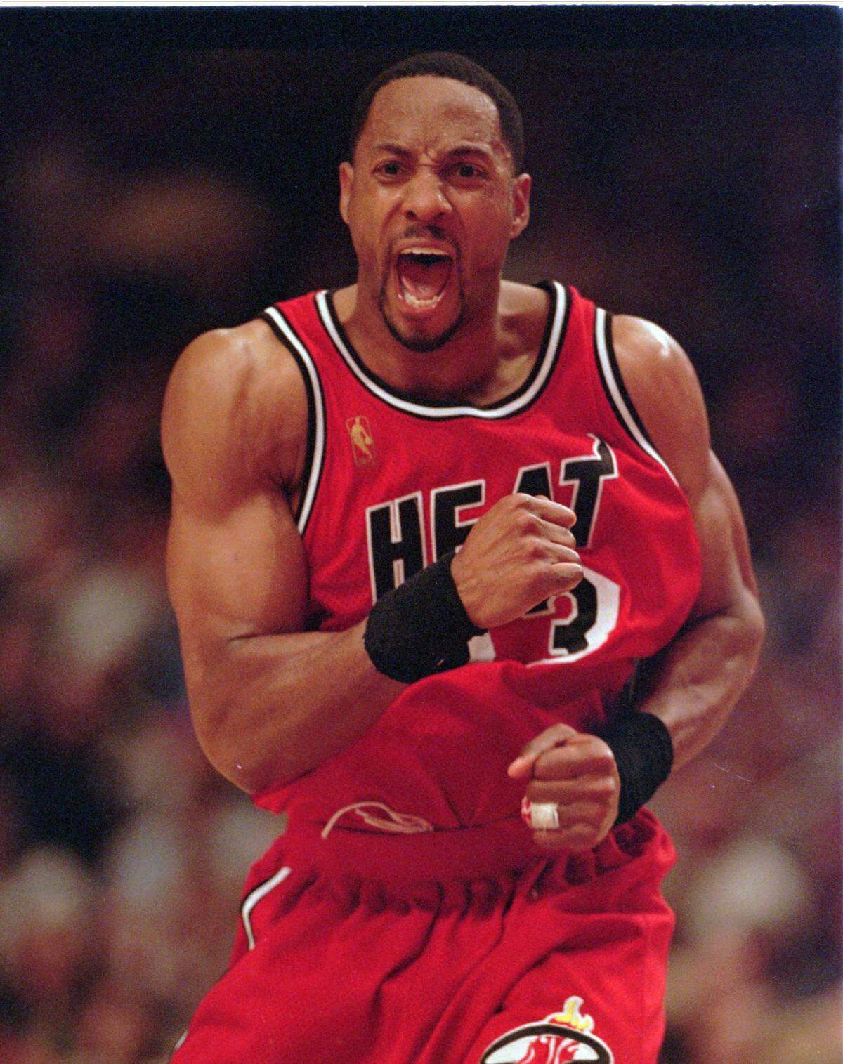 Miami Heat’s Alonzo Mourning celebrates a three point basket with less than two minutes left in the game against the New York Knicks Friday May 16, 1997 in New York. Mourning, who had the game high 27 points, and the Heat defeated the Knicks 95-90 in game six of the Eastern Conference semifinals forcing a game seven Sunday in Miami. (AP Photo/Mark Lennihan)