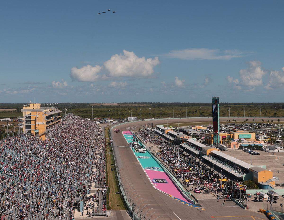 Drivers stand by their cars during the opening ceremony of Dixie Vodka 400. On Sunday, October 23, 2022 the NASCAR Cup Series Round of 8 continued with the Dixie Vodka 400, a NASCAR Cup Series race at Homestead–Miami Speedway in Homestead, Florida.