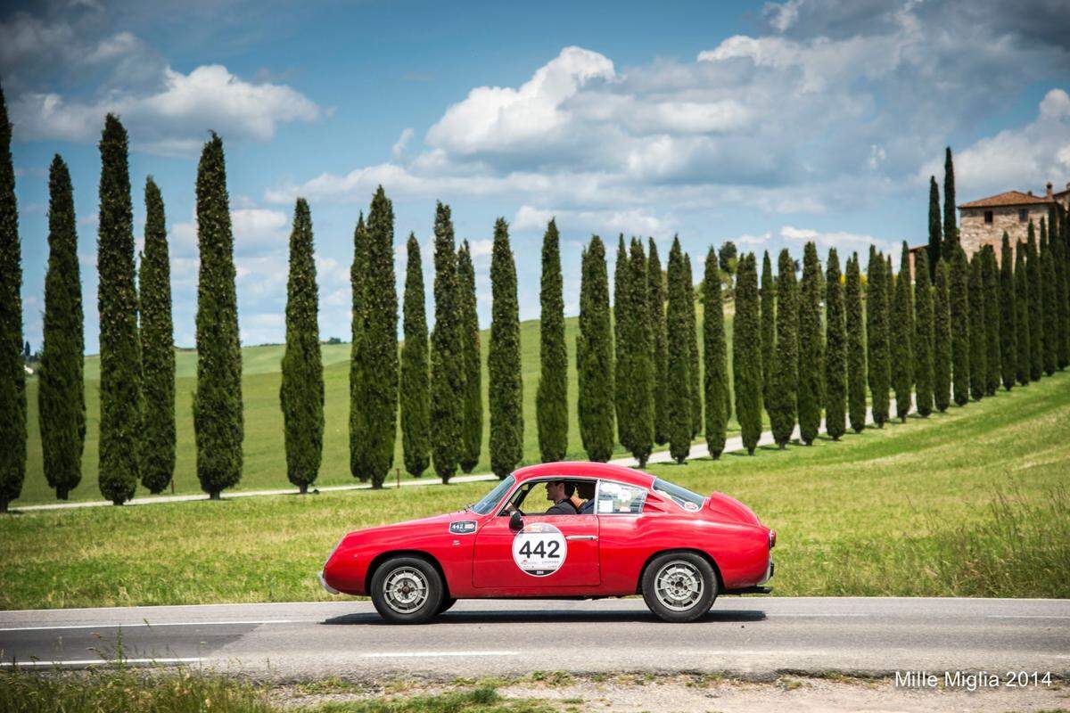 Camilo Miguel Jr. driving a 1958 Fiat Zagato in Italy’s annual Mille Miglia car race, where competitors drive vintage autos.