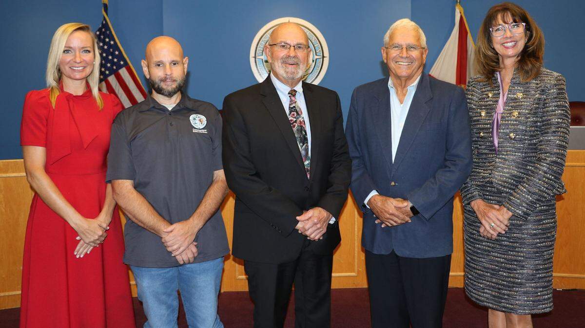 Monroe County commissioners stand for an official photo. Eddie Martinez, second from the left, resigned Tuesday, Dec. 7, 2021, following his arrest a week earlier on a domestic abuse charge. Also pictured are Commissioner Holly Raschein, Mayor David Rice, Mayor Pro Tem Craig Cates and Commissioner Michelle Coldiron.