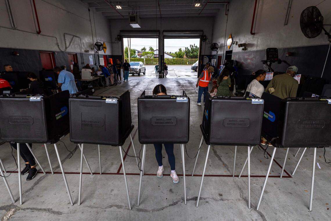Voters stand at the polls during Election Day 2024 at Miami-Dade County Fire Station #56 on Tuesday, November 5, 2024, in Miami, Fla.