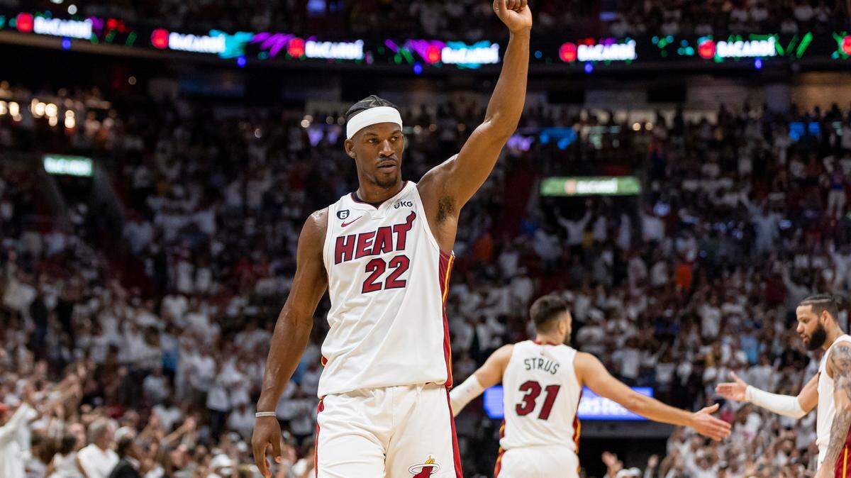 Miami Heat forward Jimmy Butler (22) reacts after his team scored against the New York Knicks in the fourth quarter of Game 4 of the NBA Eastern Conference Semifinals at the Kaseya Center in Miami on Monday, May 8, 2023.