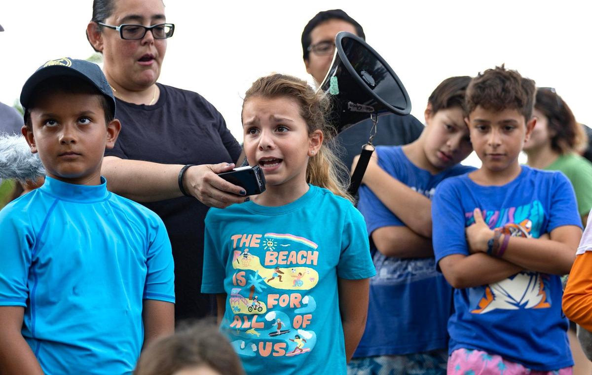 Helena Lourenco, 8, comments against the Florida Department of Environmental Protection’s plan to add pickleball courts, cabins, and a disc golf course to Oleta River State Park in North Miami Beach, Florida on Tuesday, August 27, 2024.