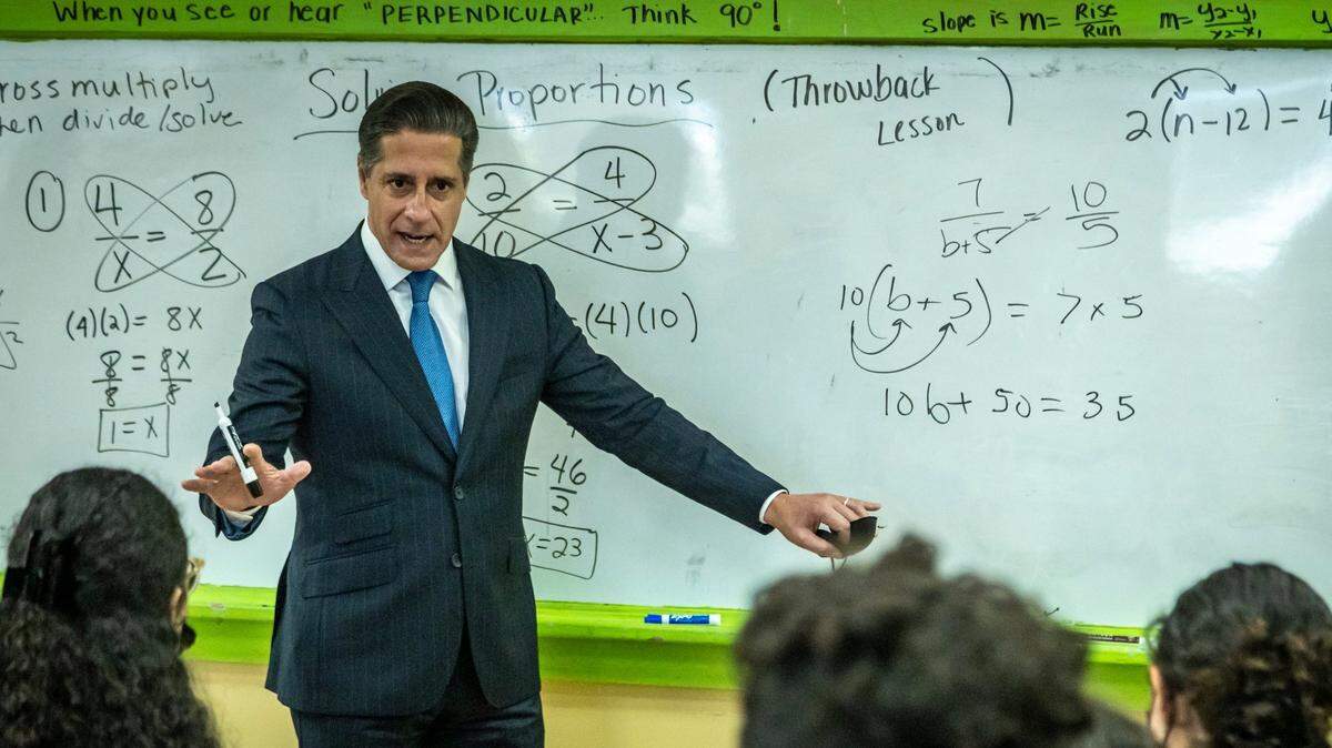 Former Miami-Dade Schools Superintendent Alberto Carvalho works on a geometry problem with Felicia Williams’ 10th grade geometry class at Hialeah Senior High, February 3, 2022.