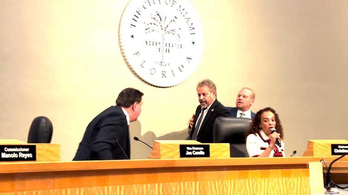 Commissioners Joe Carollo, left, and Miguel Gabela.