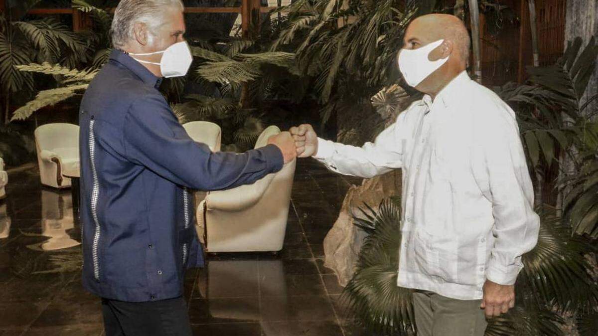 In August 2021, Cuban leader Miguel Díaz-Canel greets Carlos Lazo, a Cuban-American activist, in Havana.