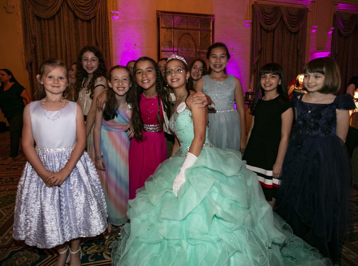 Angelina Uzdavines, 11, celebrates her 11th birthday with friends at the Biltmore Hotel during the Make-A-Wish Glitter Gala in Coral Gables on Friday, March 1, 2019.