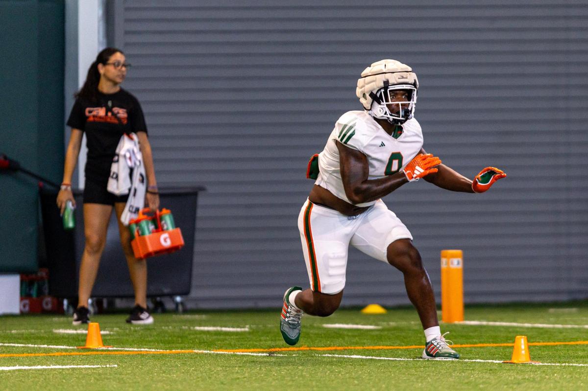 Miami Hurricanes tight end Elijah Lofty runs during practice drills at the Carol Soffer Indoor Practice Facility in Coral Gables, Florida, on Tuesday, April 2, 2024.