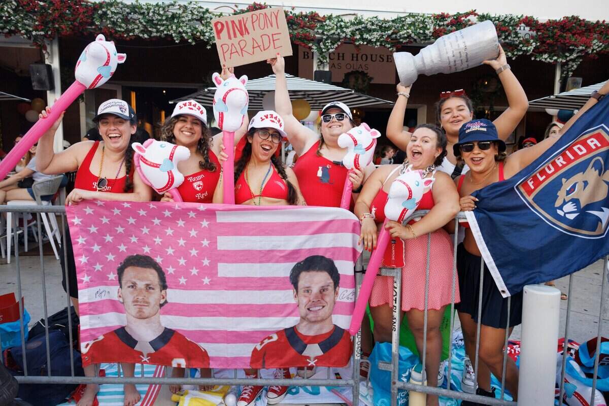 A group of friends that created a “Pink Pony Parade” theme attend the Florida Panthers Stanley Cup Championship victory parade on Sunday, June 22, 2025 down A1A in Fort Lauderdale, Fla. The Florida Panthers have been seen playing the song Pink Pony Club, the known Edmonton Oilers victory song, in their celebrations around town.