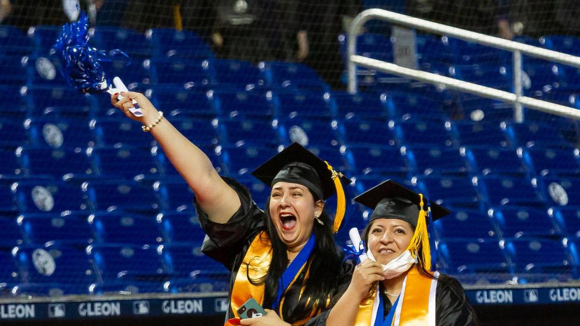 Miami Dade College students celebrate during their graduation ceremony inside loanDepot park in Miami, Florida on Saturday, May 1, 2021.