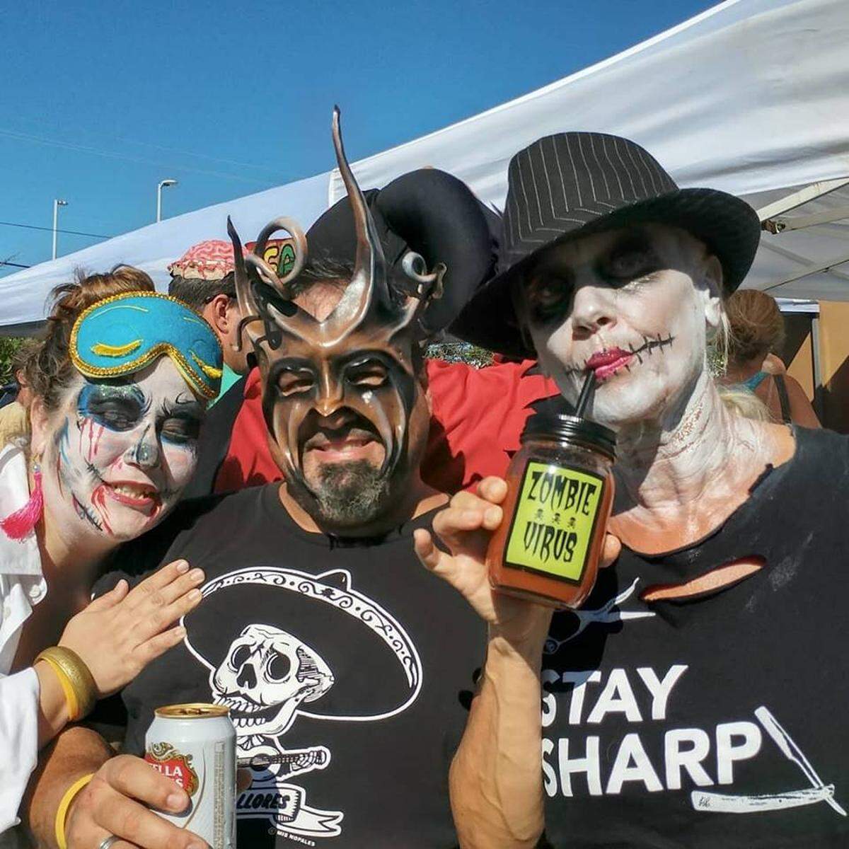 Revelers take part in the Zombie Bike Ride on Saturday, Oct. 20, 2018.