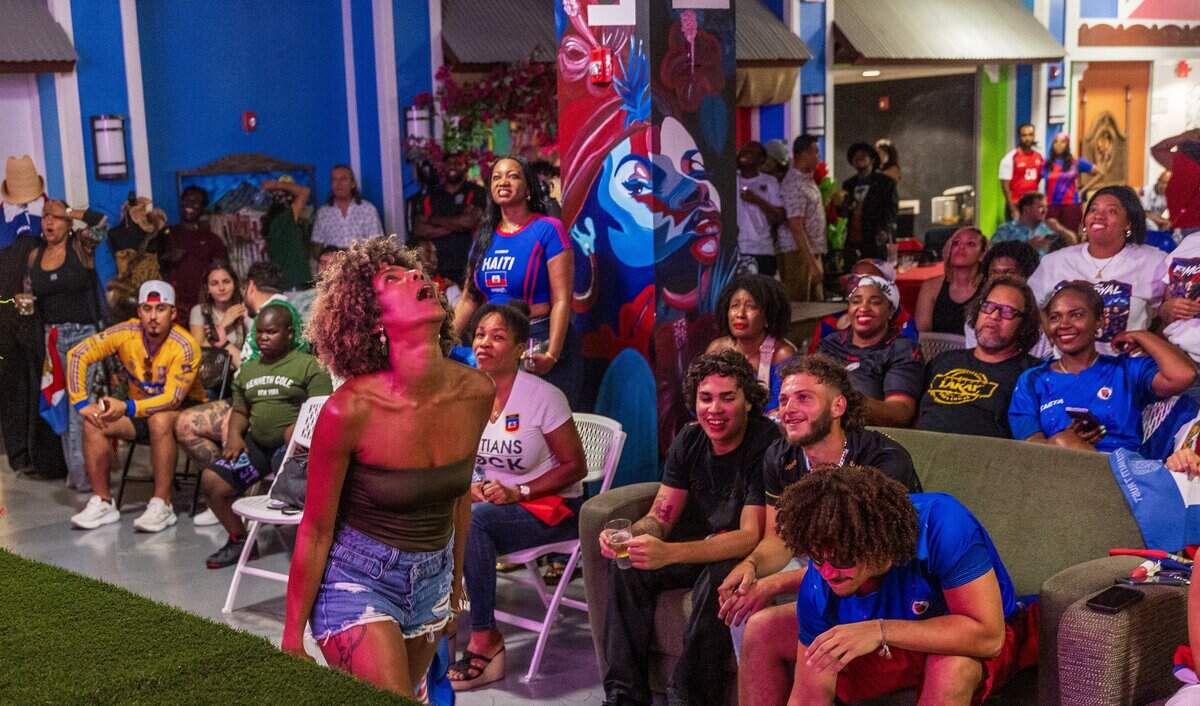 Haiti's soccer team fans including Carolyn Desert (center) reacts as they watched the Haiti vs. Scotland Fifa World Cup game, in Boston, during a game watch party at the Haitian Cultural Center in Little Haiti, on Saturday June 13, 2026.